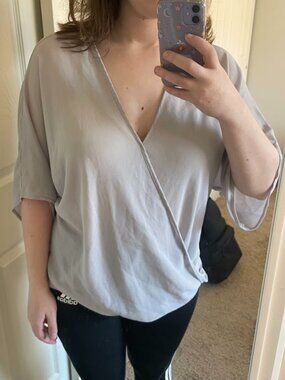 Wayf slightly sheer periwinkle faux wrap top